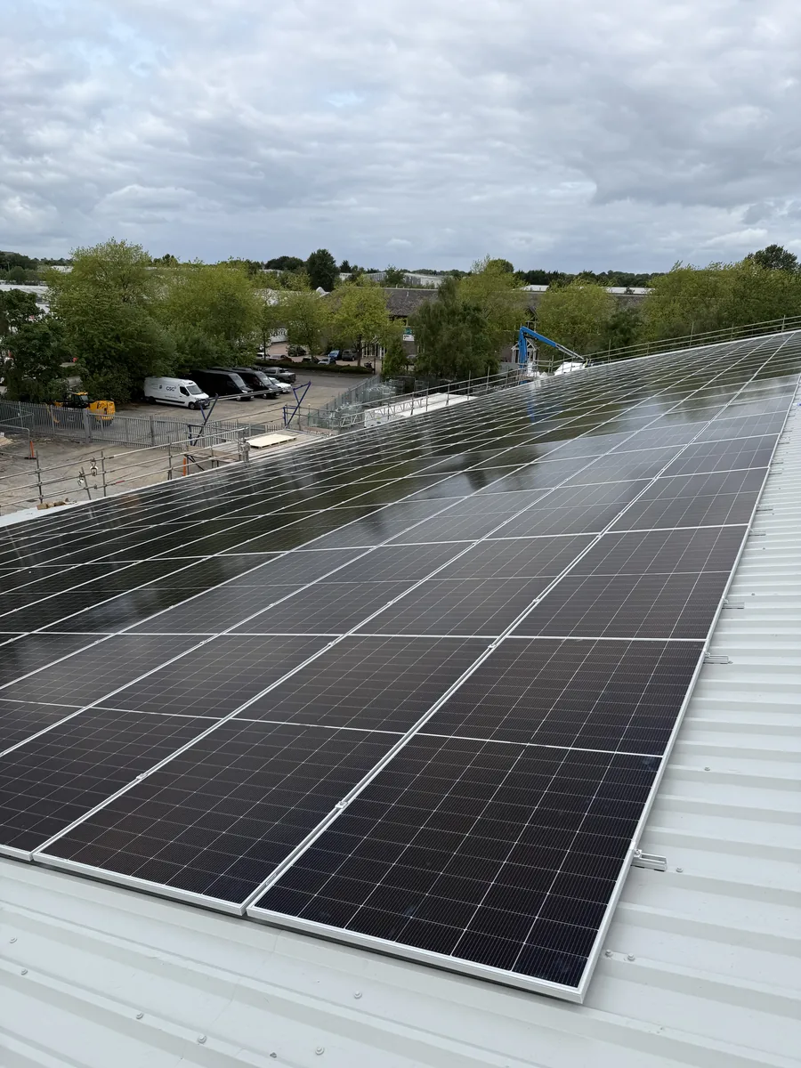 Long row of solar panels on the Booker Watford roof
