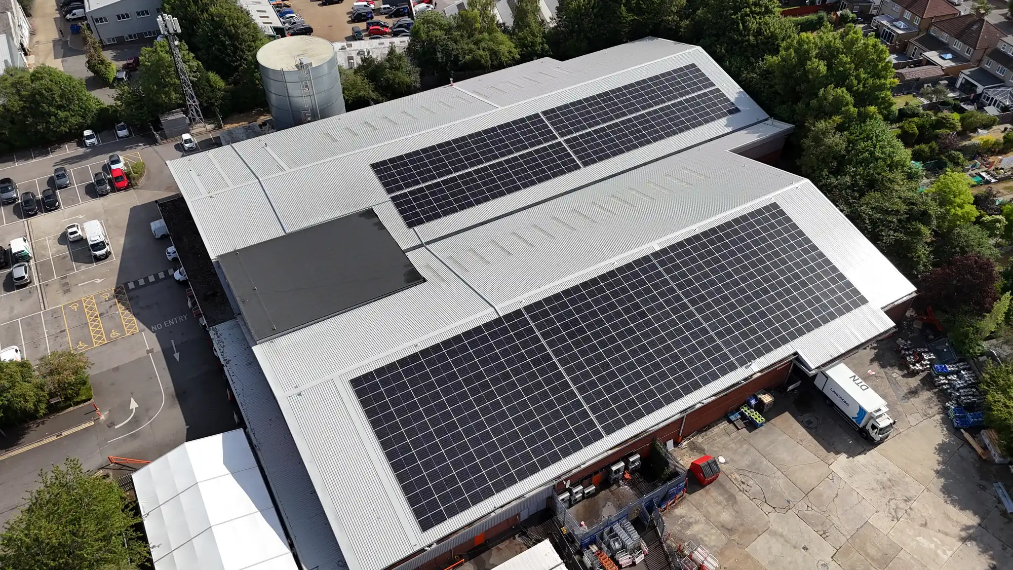 Aerial view of both rooftop solar arrays on the Booker Watford warehouse