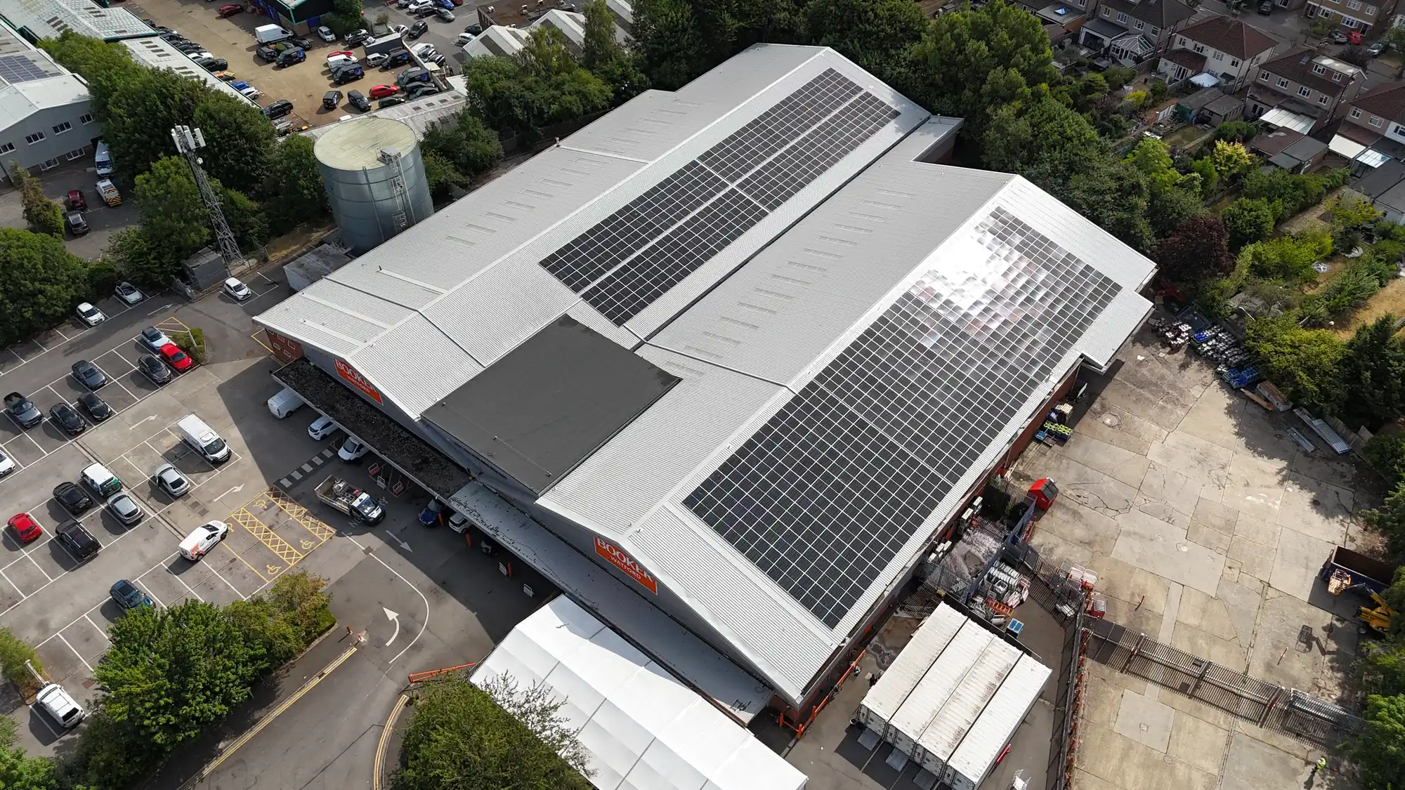 Large industrial roof from the air with a new rooftop array