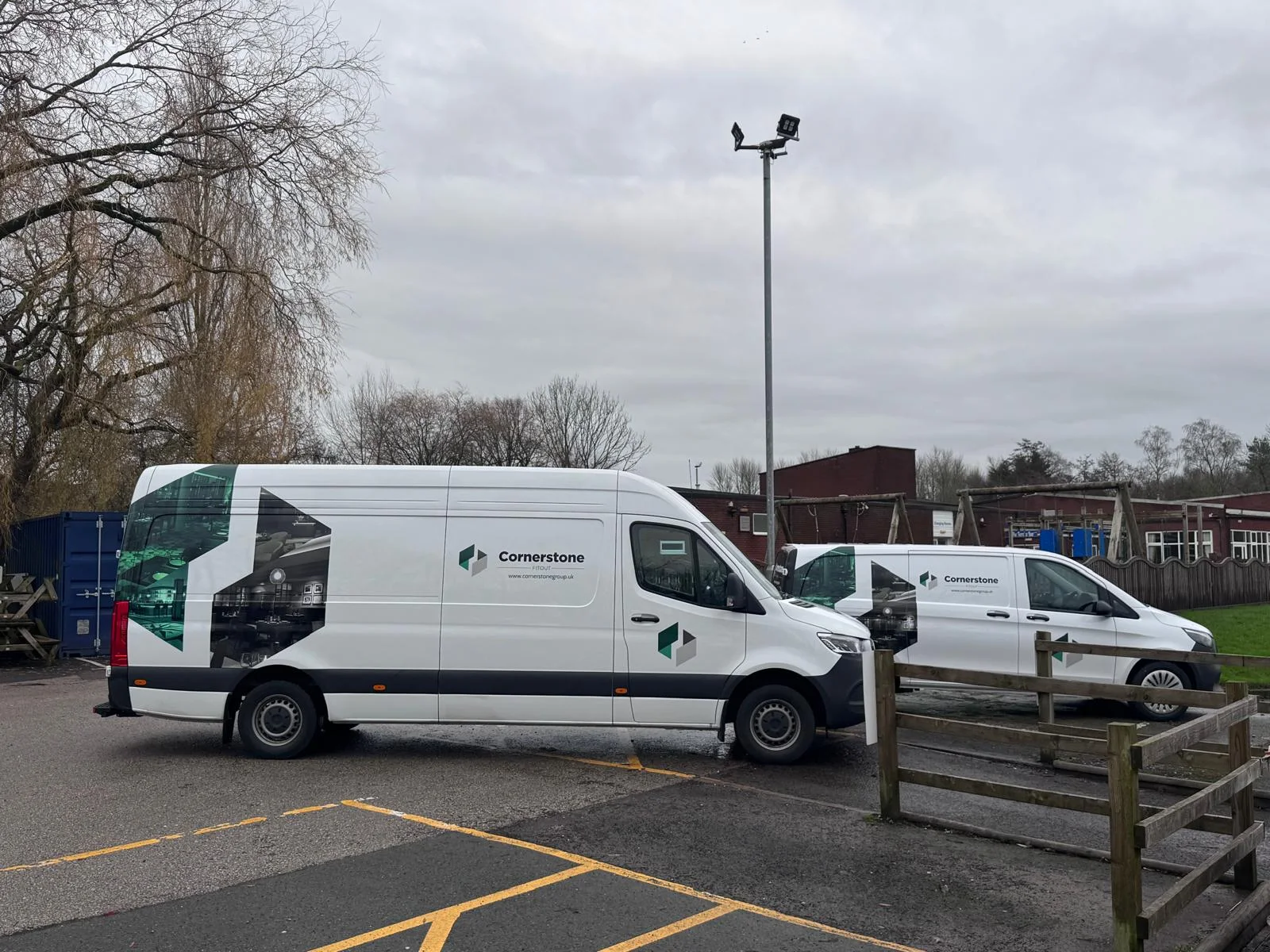 Cornerstone vans in the car park at Preston Grasshoppers